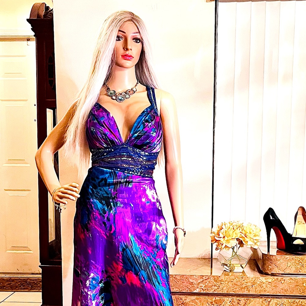 Pristine evening dress. Sequence is hand beaded never worn size small